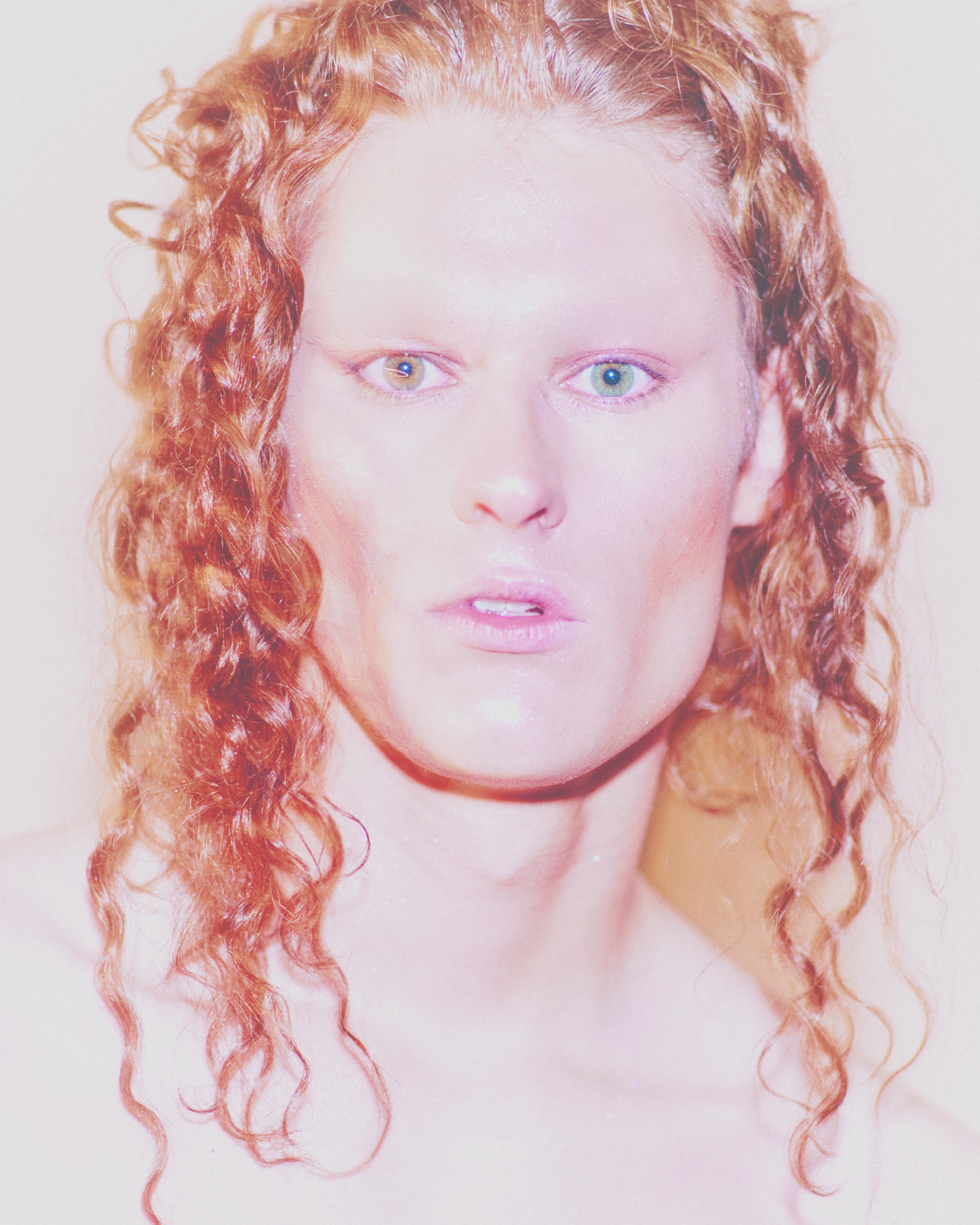High key golden curls studio shot